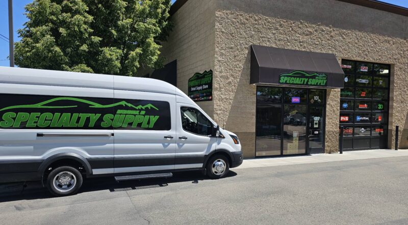 Specialty Supply wrapped delivery van at the Meridian storefront