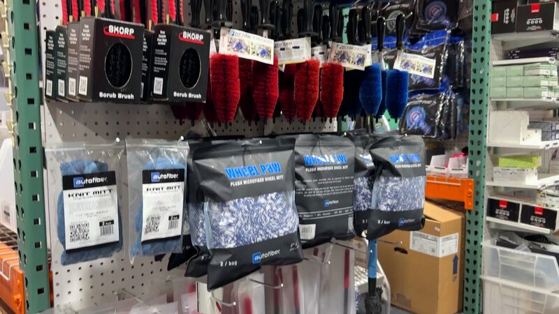 Wash brush and mitt wall at Specialty Supply